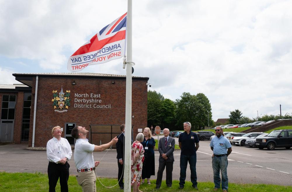 Cllr. Fawcett raises Armed Forces Day flag outside of North East Derbyshire District Council